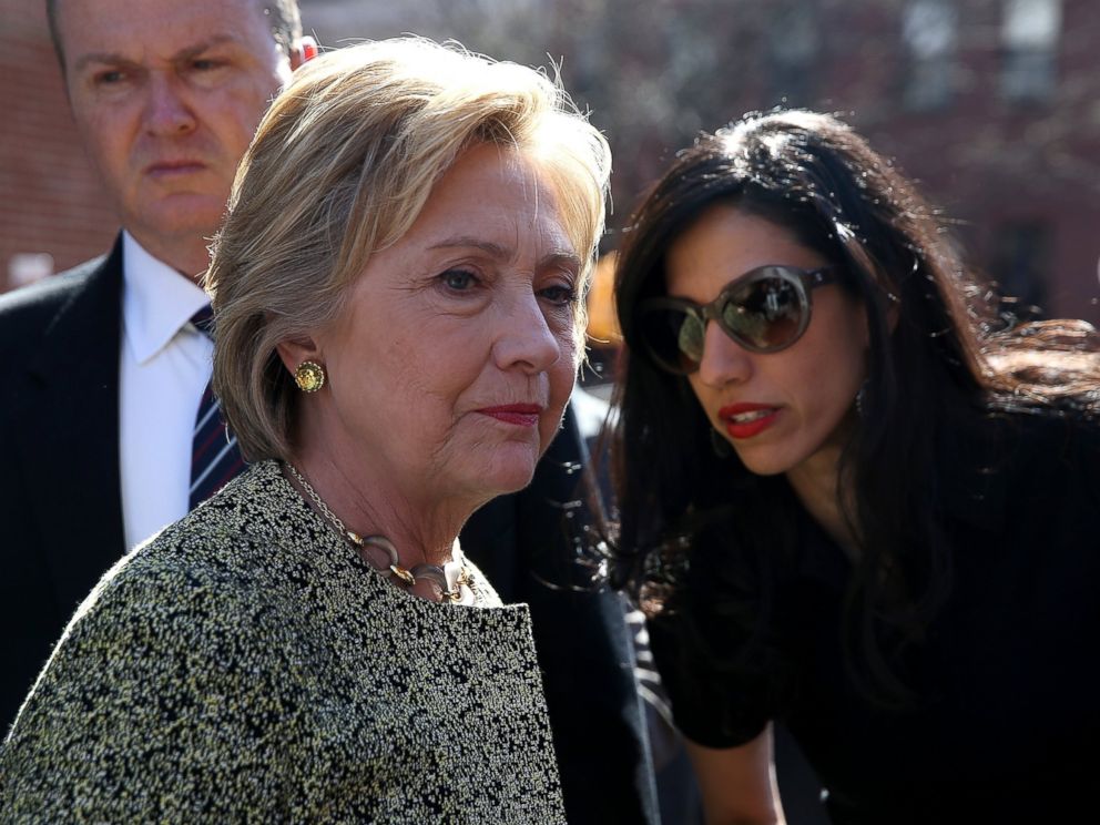 PHOTO: Democratic presidential candidate Hillary Clinton talks with aide Huma Abedin before speaking at a neighborhood block party in the Brooklyn borough of New York City, April 17, 2016.