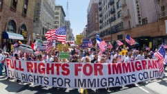 PHOTO: Demonstrators seeking change in immigration policy march on May Day in Los Angeles, May 01, 2013.