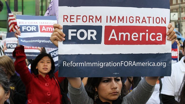 PHOTO:A slew of controversial state laws to go into effect Jan. 1. Pictured, protesters carry signs during an immigration reform demonstration March 24, 2010 in San Francisco, California with more than 2,000 demonstrators in attendance.