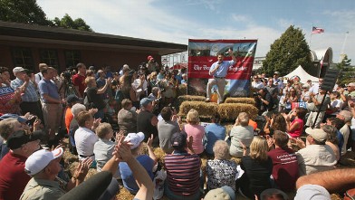 PHOTO: Republican presidential candidate and Texas Governor Rick Perry speaks to visitors at the Iowa State Fair Aug. 15, 2011 in Des Moines, Iowa.