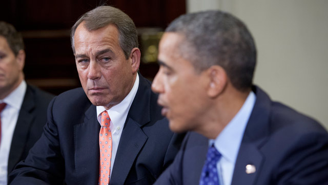 PHOTO: Speaker John Boehner, R-OH., listens to President Barack Obama speak before a budget meeting at the White House with other cabinet members on Nov. 16, 2012 in Washington, D.C.