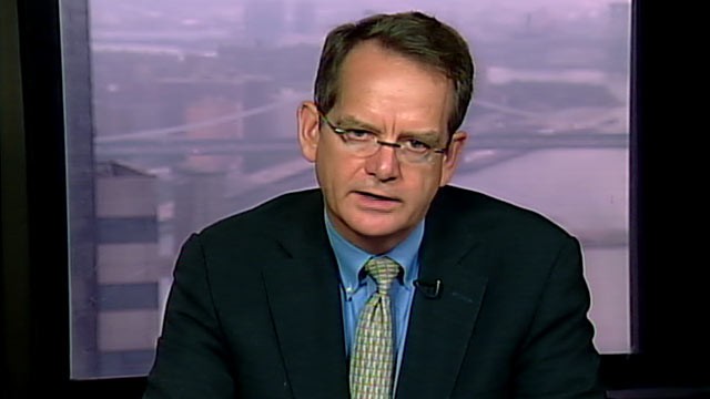 PHOTO: Standard & Poor's Managing Director, John Chambers is interviewed on