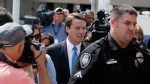 PHOTO: John Edwards, center, and his daughter Cate Edwards walk around the federal courthouse during jury deliberations in Greensboro, N.C.