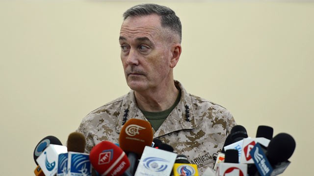 PHOTO: Gen. Joseph Dunford, Commander of the international coalition in Afghanistan, speaks during a ceremony to hand over Bagram prison to the Afghanistan government at Bagram Prison facilities on March 25, 2012.
