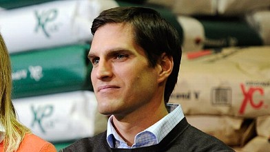 PHOTO: Josh Romney son of Republican Presidential hopeful and former Massachusetts Gov. Mitt Romney, looks on during a town hall meeting, December 9, 2011 in Cedar Rapids, Iowa.