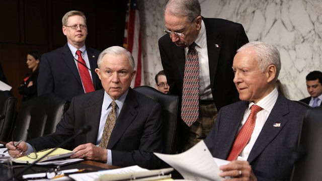 PHOTO: Sen. Chuck Grassley, R-IA, leans down to talk to Sen. Jeff Sessions, R-AL, 2nd right, and Sen. Orrin Hatch, R-UT, right, prior to a hearing before the Senate Judiciary Committee, April 19, 2013, on "Comprehensive Immigration Reform Legislation" on