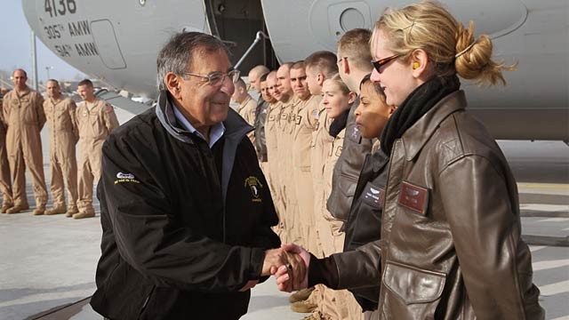 PHOTO: Leon Panetta and female Marine Corps pilot