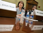 IRS official Lois Lerner pauses during a House Oversight and Government Reform Committee hearing on Capitol Hill in Washington, May 22, 2013, to investigate the extra scrutiny the IRS gave to Tea Party and other conservative groups that applied for tax-exempt status.