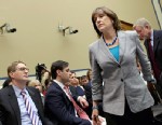 IRS Director of Exempt Organizations Lois Lerner leaves a hearing of the House Oversight and Government Reform Committee, May 22, 2013, in Washington.