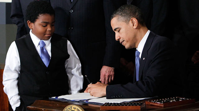 PHOTO: President Barack Obama signs the Affordable Health Care for America Act during a ceremony with fellow Democrats in the East Room of the White House in this March 23, 2010 file photo in Washington, DC.