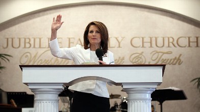 PHOTO: Republican presidential candidate Rep. Michele Bachmann gives her personal testimony while attending services at the Jubilee Family Church,Oskaloosa, Iowa, Jan. 1, 2012.