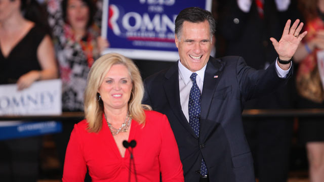 PHOTO: Mitt Romney and his wife Ann greet supporters at a victory party following the close of voting for the Illinois primary March 20, 2012 in Schaumburg, Illinois.