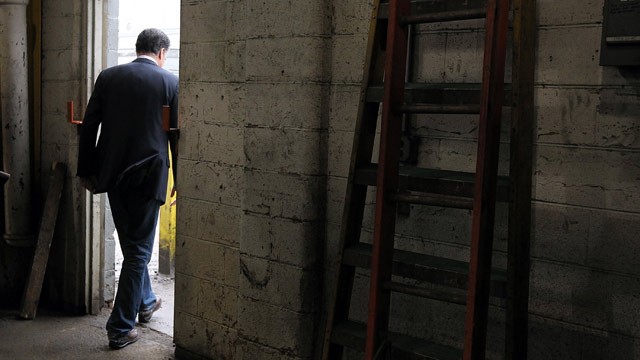 PHOTO: Republican presidential candidate, former Massachusetts Gov. Mitt Romney walks out of a door after he toured a manufacturing facility following a campaign rally at American Posts on February 29, 2012 in Toledo, Ohio.