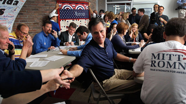 PHOTO: Republican presidential candidate and former Massachusetts Gov. Mitt Romney works the phones for votes at his campaign headquarters, Jan. 31, 2012 in Tampa, Florida.