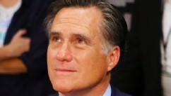 PHOTO: Former Republican presidential candidate and Massachusetts Gov. Mitt Romney sits ringside before Manny Pacquiao takes on Juan Manuel Marquez in their welterweight bout at the MGM Grand Garden Arena on Dec. 8, 2012 in Las Vegas.