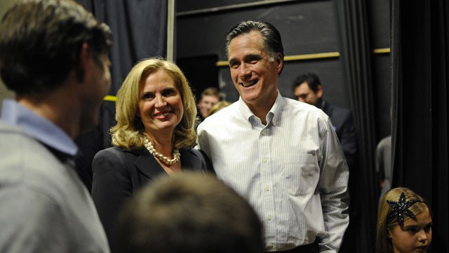 PHOTO: Republican presidential hopeful Mitt Romney shares a moment with his wife Ann and family prior to get on stage to address a rally at McKelvie Intermediate School in Bedford, New Hampshire, Jan. 9, 2012.