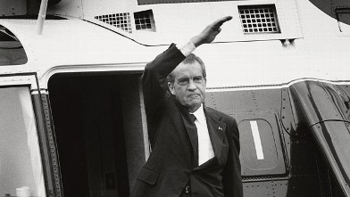 PHOTO: U.S. President Richard Nixon stands on the steps of the presidential helicopter as he waves goodbye to the White House for the final time after resigning the presidency Aug. 9, 1974 in Washington, D.C.