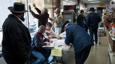 PHOTO: People arrive to vote at Beck's Mill General Store during election day on Nov. 6, 2012, in Becks Mill, Ohio.