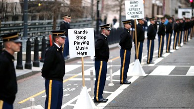PHOTO: Members of the U.S. military line 15th Street NW during a dress rehearsal for the Presidential Inaugural parade, Jan. 13, 2013 in Washington, DC.