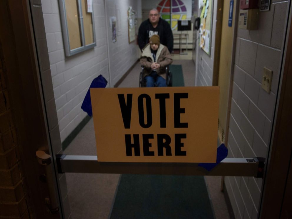 PHOTO: Voters leave a polling station during primary voting, March 15, 2016, in Canton, Ohio.