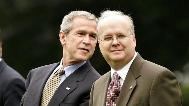 PHOTO: President George W. Bush and Deputy Chief of Staff Karl Rove walk from the Oval Office across the South Lawn of the White House toward Marine One July 14, 2005 in Washington, DC.