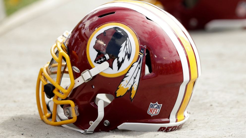 PHOTO: Washington Redskins helmets lay on the ground during their game against the Oakland Raiders on September 29, 2013 in Oakland, Calif.