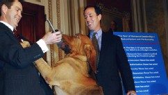 PHOTO: Sen. Rick Santorum, right, with bloodhounds at a news conference of GOP Senate leadership.