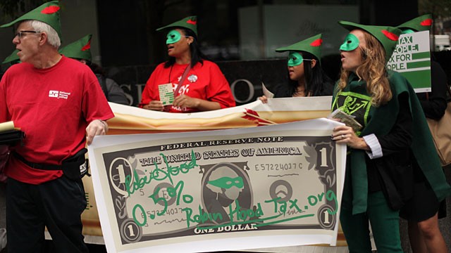 PHOTO: The U.S. Robin Hood Tax Campaign protest outside JP Morgan Stanley Corporate Headquaters on June 19, 2012 in New York City.
