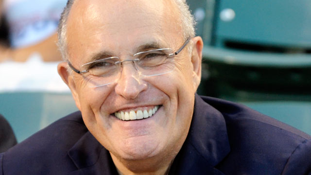 PHOTO: Rudy Giuliani smiles before the game between the Chicago Cubs and the Atlanta Braves, August 22, 2011 at Wrigley Field in Chicago, Illinois.