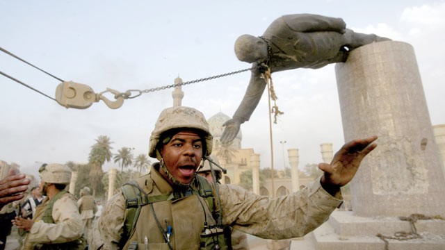 PHOTO: U.S. Marines pull down a statue of Saddam Hussein in the centre of Baghdad on April 9, 2013.