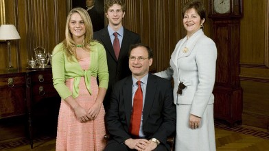 PHOTO: Justice Samuel A. Alito, Jr. poses with his wife, Martha-Ann, and his children, Laura and Philip, in the Justices' Dining Room at the U.S. Supreme Court February 16, 2006 in Washington, DC.