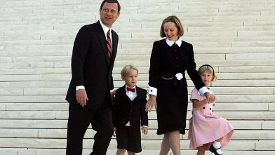 PHOTO: Chief Justice John Roberts walks with his wife Jane Roberts and their children Jack Roberts and Josie Roberts at the Supreme Court after he took the Supreme Court bench for the first time October 3, 2005 in Washington, DC.