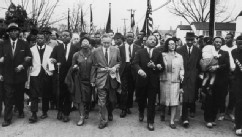 PHOTO: American civil rights campaigner Martin Luther King (1929  - 1968) and his wife Coretta Scott King lead a black voting rights third march from Selma, Ala., to the state capital in Montgomery, March 30, 1965.
