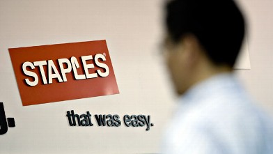 PHOTO: A Staples logo hangs on a wall inside a Staples store in New York on May 26, 2009.