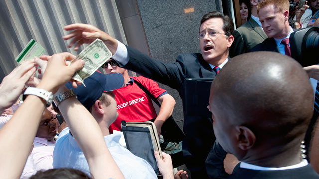 PHOTO: Stephen Colbert began accepting donations for $50 or less on the sidewalk outside the building.