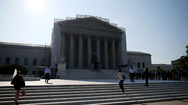 PHOTO: People wait to enter the U.S. Supreme Court building, June 24, 2013, in Washington.