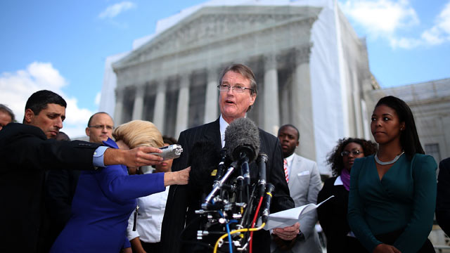 PHOTO: Bill Powers (C), President of the University of Texas at Austin, speaks to the media after attending arguments on whether the universitys consideration of race in admissions is constitutional at the U.S. Supreme Court Supreme, on October 10, 2012