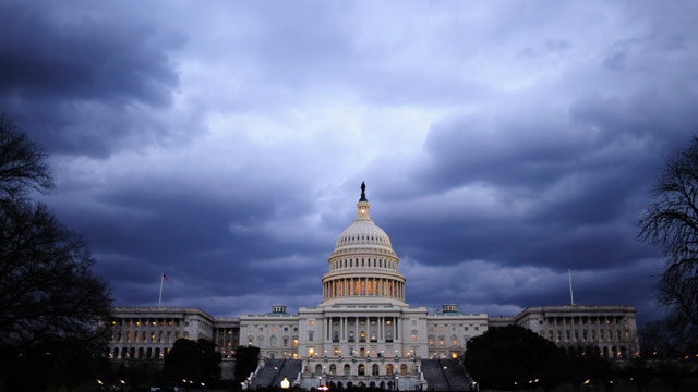 PHOTO: Dark clouds hang over the U.S. Capitol in Washington, D.C., U.S., on Thursday, Feb. 28, 2013.