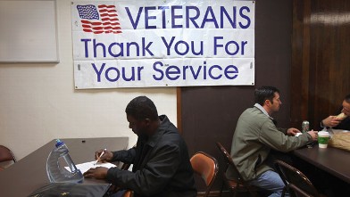 PHOTO: Unemployed U.S. Air Force veteran Tracy McConner, 45, registers at the Military and Veterans Employment Expo on May 24, 2011 in Golden, Colorado.