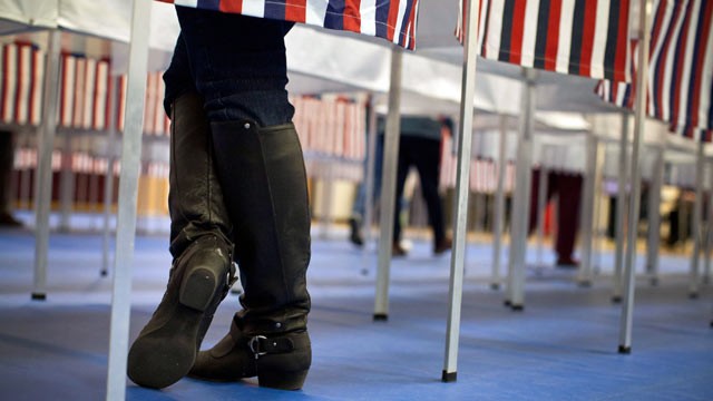 PHOTO: A woman votes in the New Hampshire primary at Bedford High School on Jan. 10, 2012 in Bedford, New Hampshire.