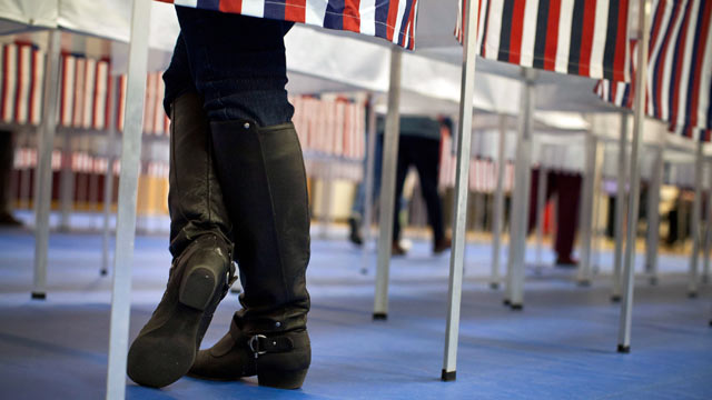 PHOTO: A woman votes in the New Hampshire primary at Bedford High School on Jan. 10, 2012 in Bedford, New Hampshire.