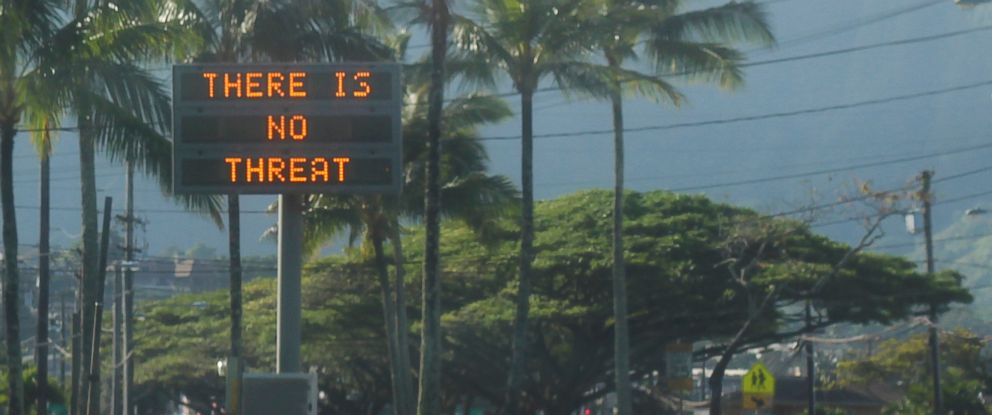 PHOTO: This Jan. 13, 2018, photo provided by Jhune Liwanag shows a highway median sign broadcasting a message of "There is no threat" in Kaneohe, Hawaii. 