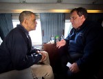 President Barack Obama and New Jersey Gov. Chris Christie talk as they fly over the coast of New Jersey on Marine One, Oct. 31, 2012.