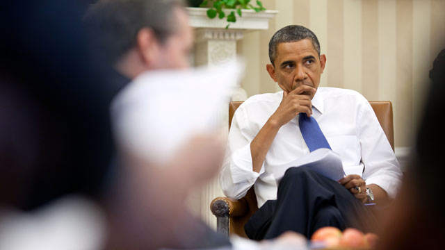 PHOTO: President Barack Obama meets with staff to discuss ongoing debt talks, in the Oval Office, July 11, 2011.