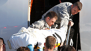 PHOTO U.S. Rep. Gabrielle Giffords, D-Ariz., is lifted onto an airplane, Jan. 21, 2011. Giffords will begin the next phase of her recovery from a gunshot wound at TIRR Memorial Hermann Rehabilitation Hospital.