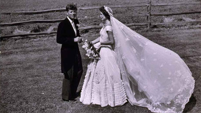 PHOTO: John Kennedy and Jackie Bouvier, in wedding attire, standing outdoors on their wedding day in Newport, Rhode Island, Sept. 12, 1953.