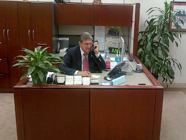 PHOTO: West Virginia Senator Joe Manchin is seen answering his own phones during the government shutdown.