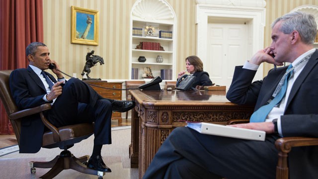 PHOTO: President Barack Obama talks on the phone with FBI Director Robert Mueller to receive an update on the explosions that occurred in Boston, in the Oval Office, April 15, 2013.