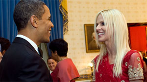 President Barack Obama greets Michaele and Tareq Salahi during a receiving line in the Blue Room of the White House before the State Dinner with Prime Minister Manmohan Singh of India.