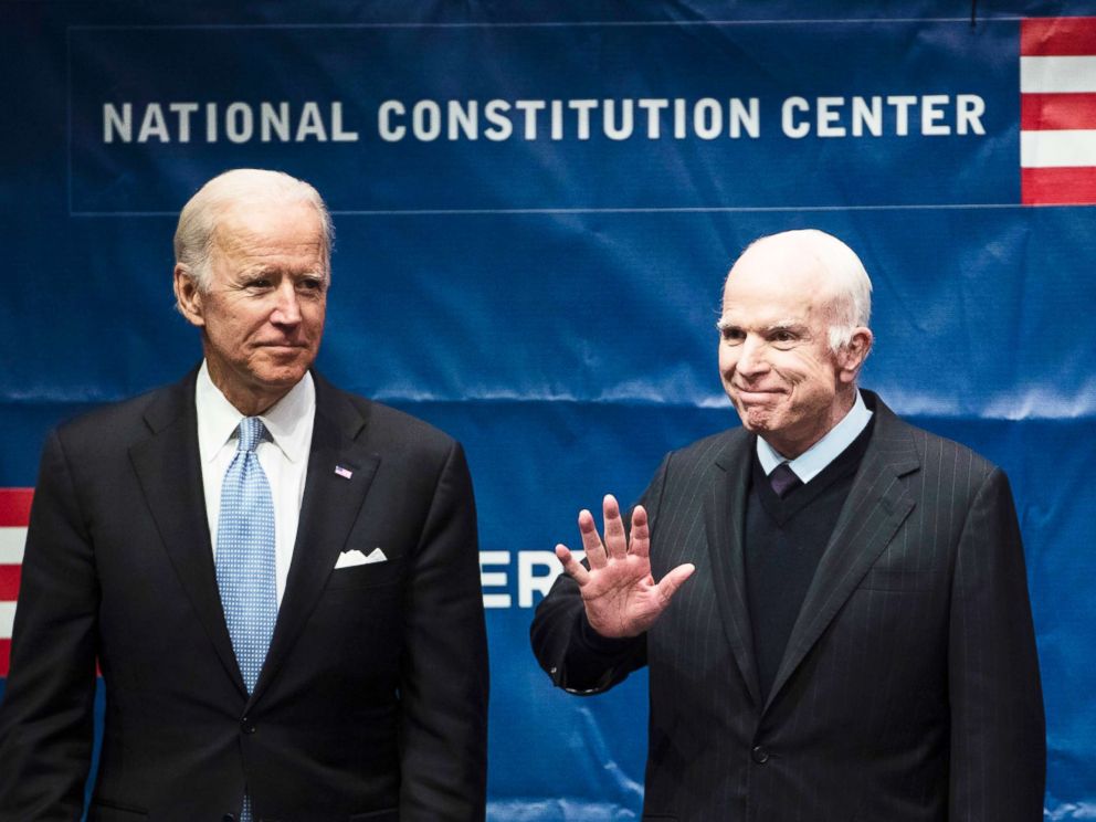 PHOTO: Sen. John McCain, right, accompanied by Chair of the National Constitution Centers Board of Trustees, former Vice President Joe Biden, waves as he takes the stage before receiving the Liberty Medal in Philadelphia, Oct. 16, 2017.